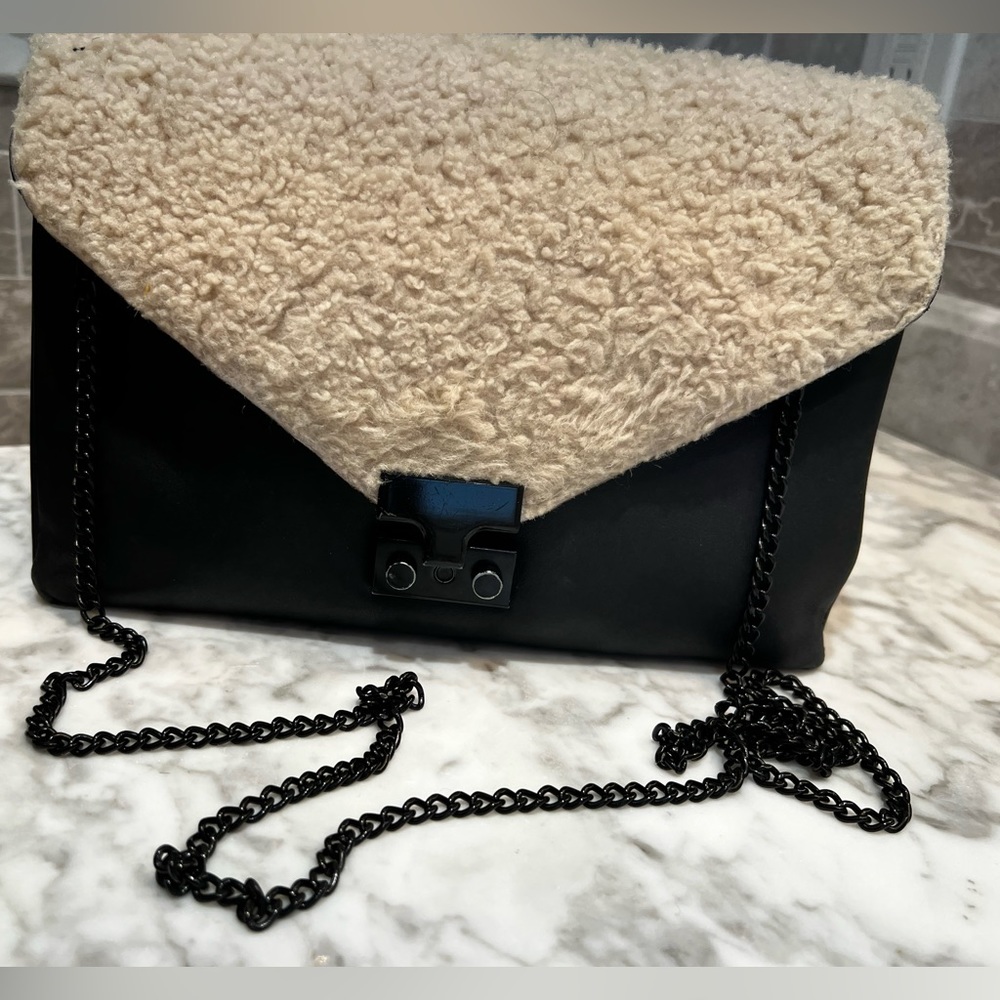 Loeffler Randal half shearling half leather envelope cross body bag